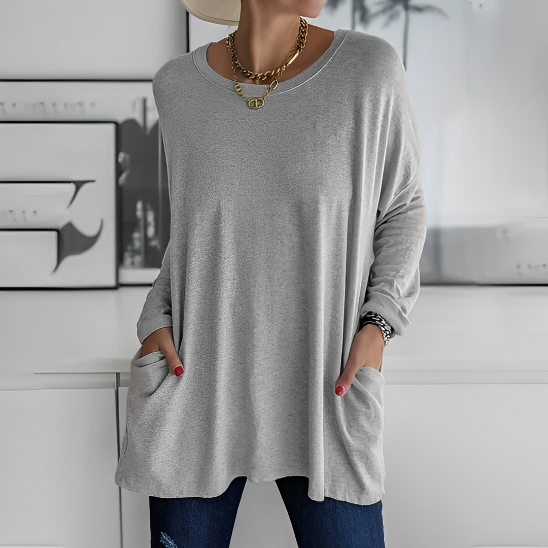 Kerstin | Stylischer Langer Pullover mit Taschen - Elle Zürich