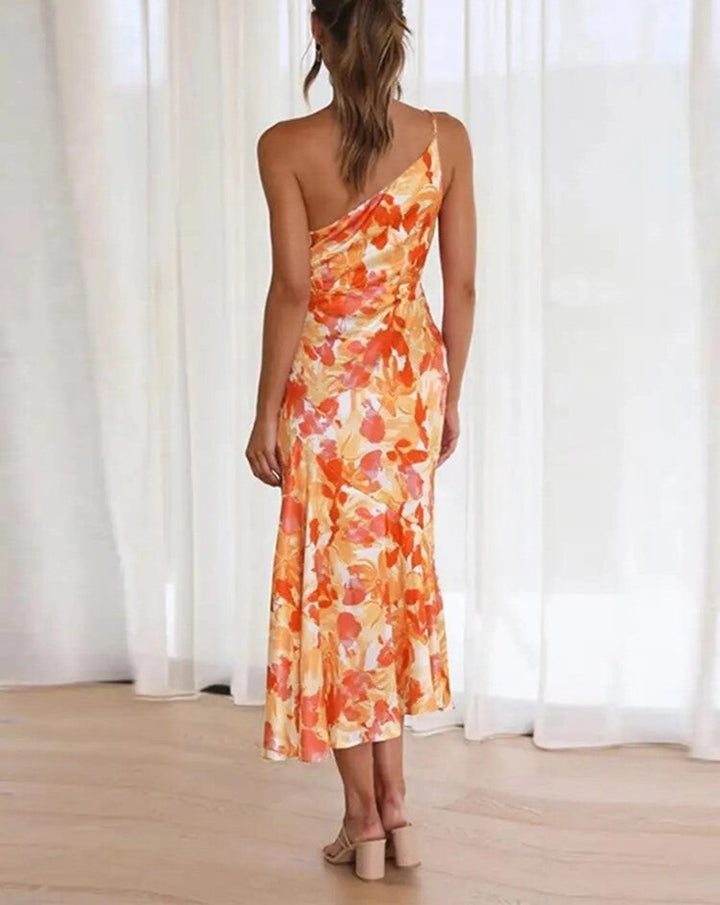 Sienna | Asymmetrisches Maxikleid mit floralem Muster für einen eleganten Look - Elle Zürich