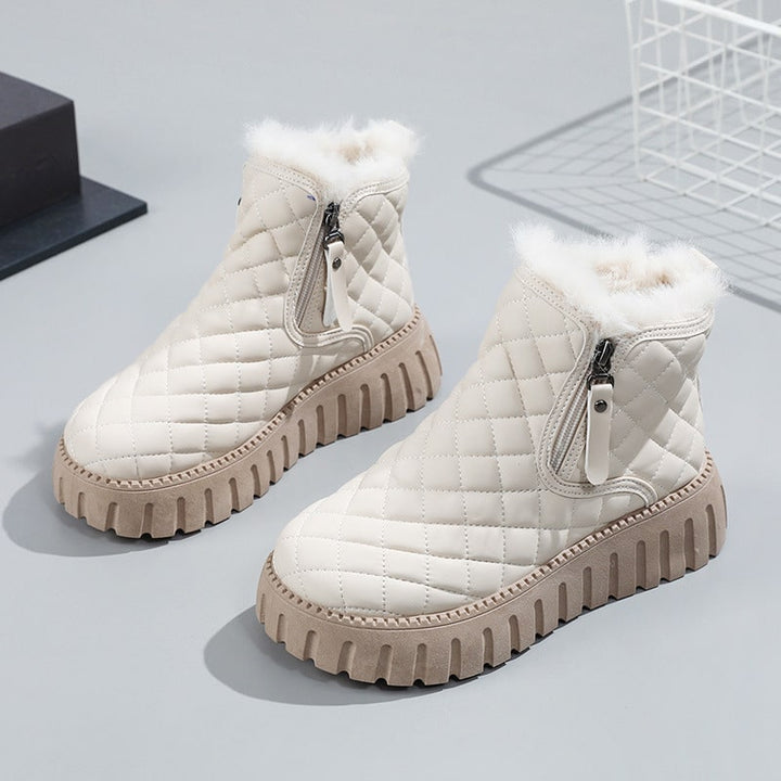 Tanja | Damen Winter-Steppstiefel mit Reißverschluss und Fellfutter - Elle Zürich