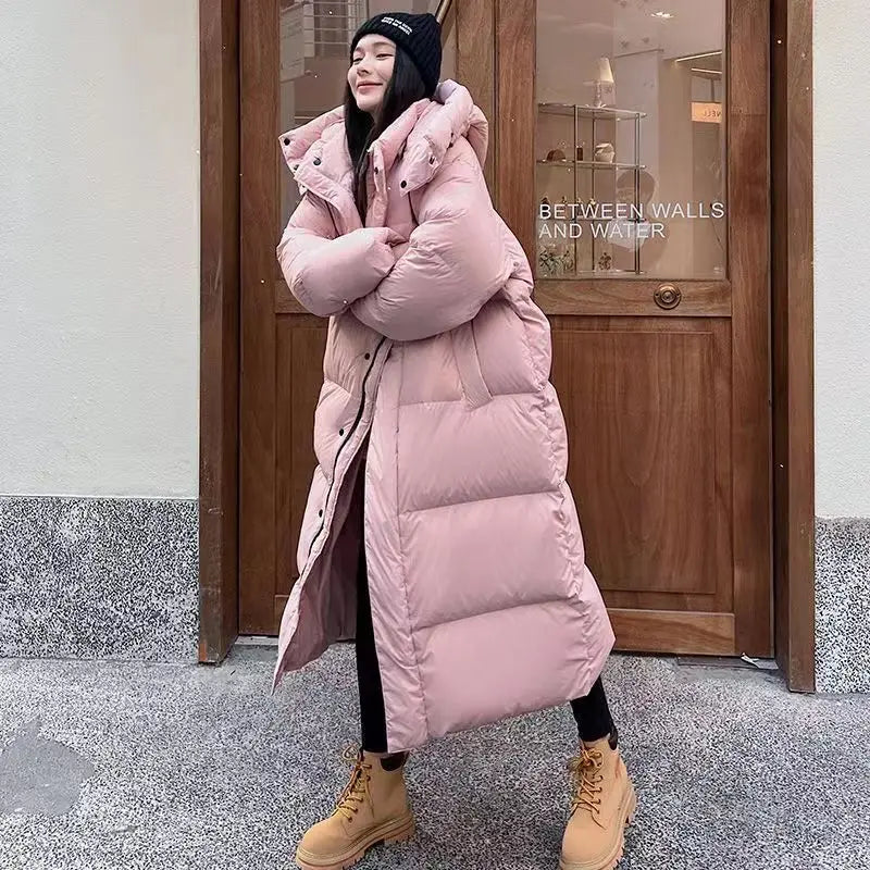 Christa | Damen Winter Steppmantel mit Kapuze - Elle Zürich