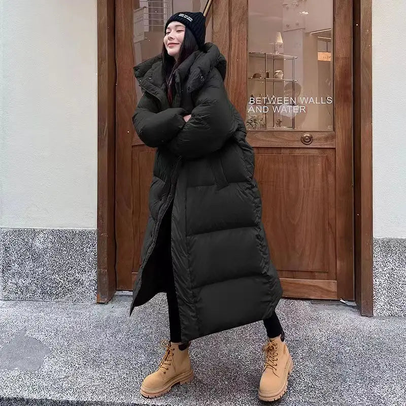 Christa | Damen Winter Steppmantel mit Kapuze - Elle Zürich