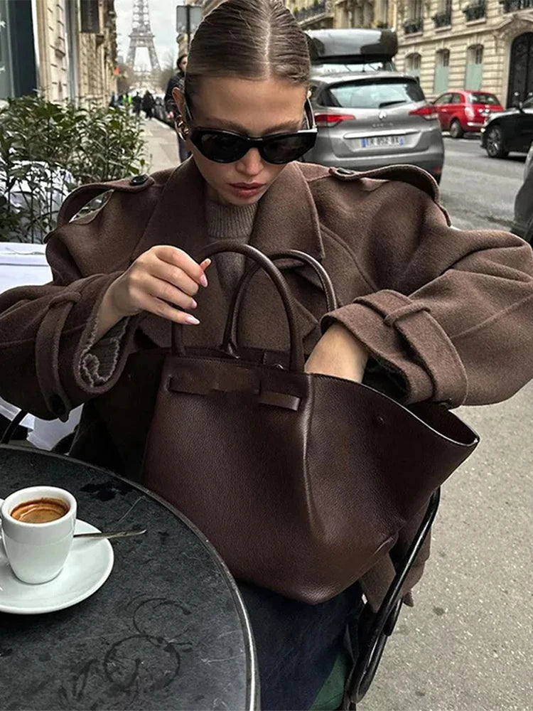 Isabella | Frauen Winterjacke mit Taillengürtel - Elle Zürich