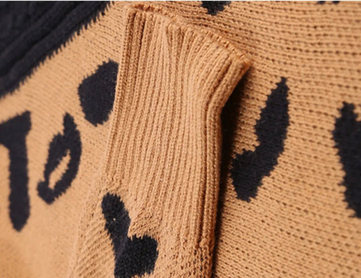 Felicia | Damen Winter-Strickpullover mit Off-Shoulder und Schnalle - Elle Zürich