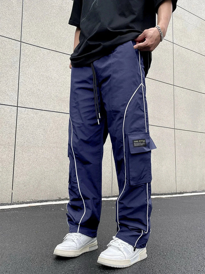 Theo | Herren Cargohose mit weitem Bein und Taschen - Elle Zürich